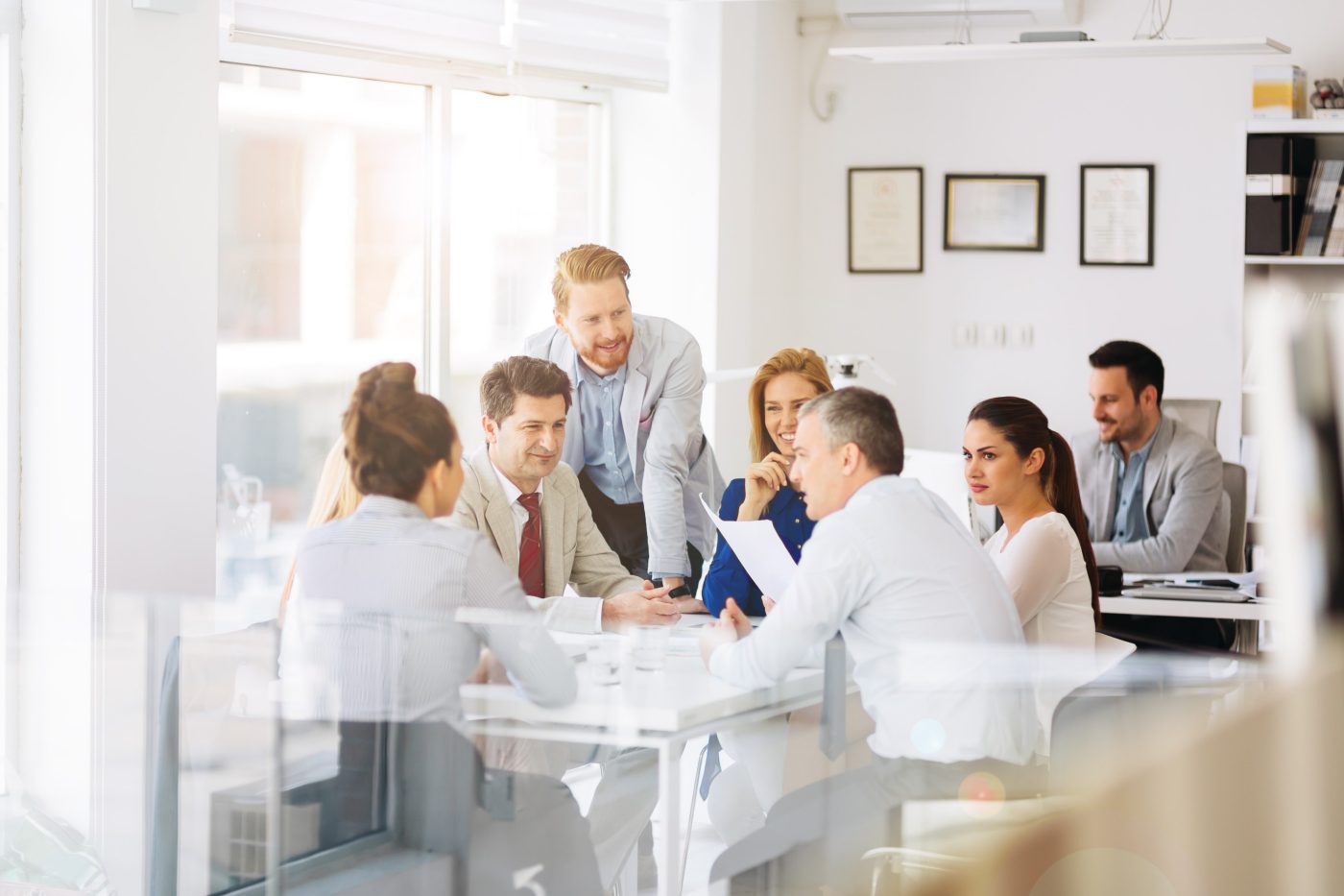 Businesspeople and architects planning for the future